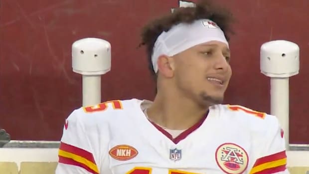 Kansas City Chiefs quarterback Patrick Mahomes expresses frustration on the bench after receiver Kadarius Toney dropped a pass in a Dec. 17, 2023 game.